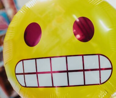 how to express your emotions grimacing emoji balloon